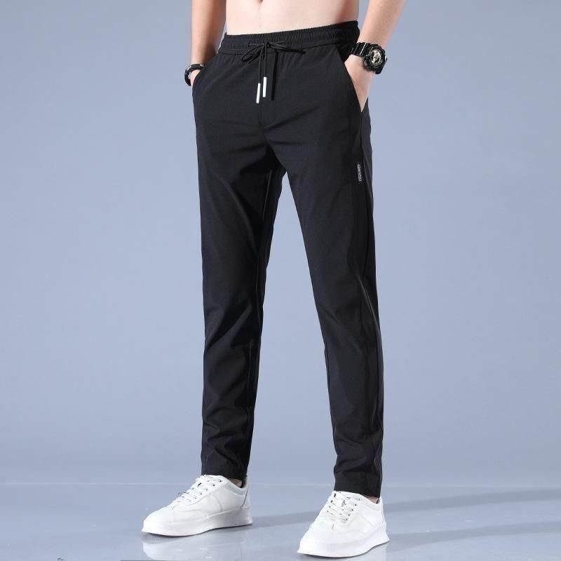 Joggers Park - Men Black Solid Slim-Fit Track Pants Black solid slim-fit track  pants with two pockets 100% Original Products Pay on delivery might be  available Easy 3 days returns and exchanges